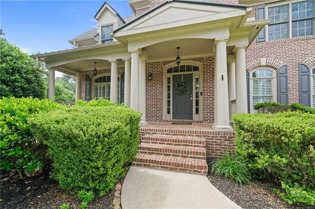 1758 Rosehedge Way NW, Kennesaw, GA 30152 - view of exterior entry featuring brick siding and a porch