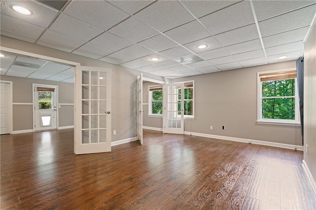 1758 Rosehedge Way NW, Kennesaw, GA 30152 - spare room featuring french doors, wood finished floors, baseboards, a paneled ceiling, and recessed lighting
