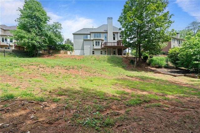 1758 Rosehedge Way NW, Kennesaw, GA 30152 - rear view of property featuring a wooden deck and a chimney