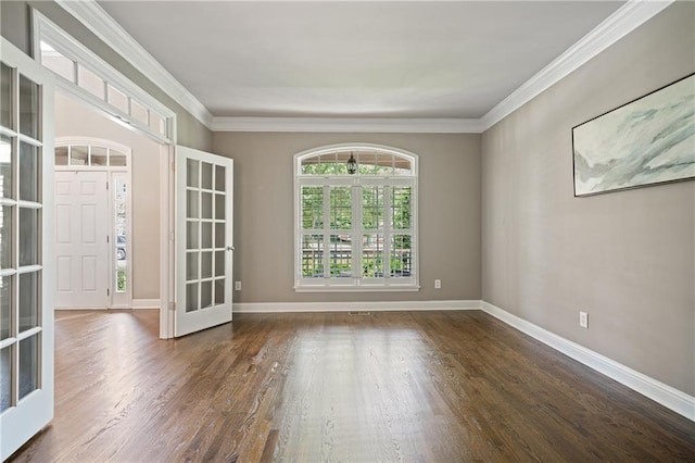 1758 Rosehedge Way NW, Kennesaw, GA 30152 - empty room featuring wood finished floors, crown molding, baseboards, and french doors