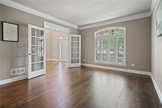 1758 Rosehedge Way NW, Kennesaw, GA 30152 - spare room featuring french doors, wood finished floors, baseboards, and crown molding