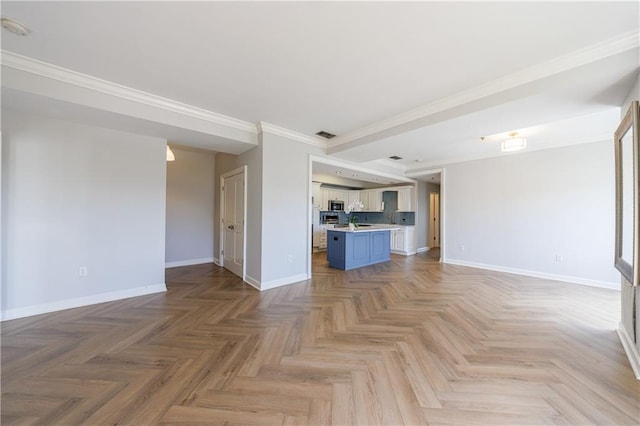 2161 Peachtree Rd NE Unit 907, Atlanta, GA 30309 - unfurnished living room featuring baseboards and ornamental molding