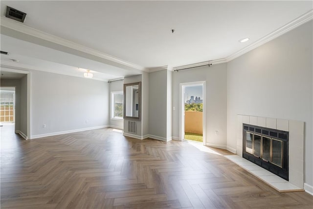 2161 Peachtree Rd NE Unit 907, Atlanta, GA 30309 - unfurnished living room featuring recessed lighting, baseboards, healthy amount of natural light, a tiled fireplace, and crown molding