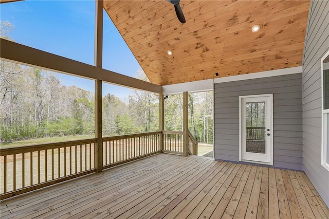 unfurnished sunroom with wooden ceiling and vaulted ceiling