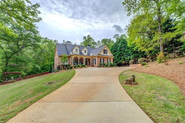 95 Weslyan Way, Oxford, GA 30054 - view of front facade with driveway and a front yard