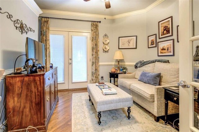 95 Weslyan Way, Oxford, GA 30054 - living area featuring light wood finished floors, ornamental molding, and ceiling fan
