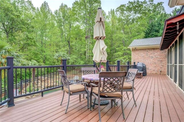 95 Weslyan Way, Oxford, GA 30054 - wooden deck featuring outdoor dining area