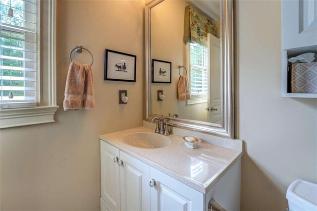 95 Weslyan Way, Oxford, GA 30054 - bathroom featuring healthy amount of natural light, vanity, and toilet