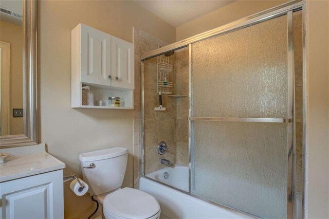 95 Weslyan Way, Oxford, GA 30054 - full bath with toilet, vanity, and combined bath / shower with glass door