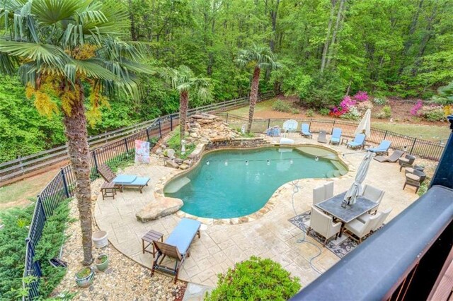 95 Weslyan Way, Oxford, GA 30054 - view of swimming pool featuring a patio area, a fenced backyard, and a view of trees