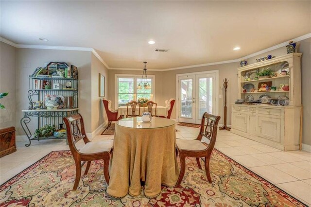 95 Weslyan Way, Oxford, GA 30054 - dining area featuring light tile patterned floors, crown molding, recessed lighting, and baseboards