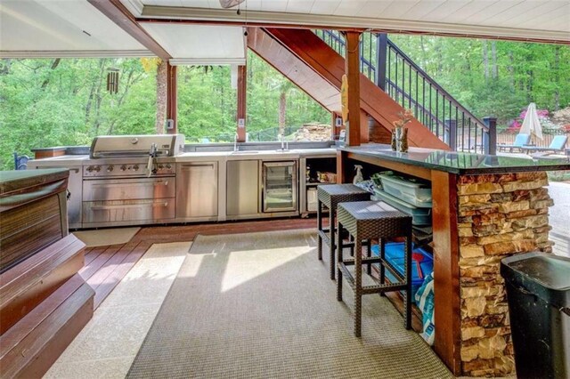 95 Weslyan Way, Oxford, GA 30054 - view of patio featuring beverage cooler, stairway, and a wooden deck