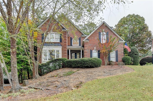 3565 Hickory Branch Trl, Suwanee, GA 30024 - view of front of property with brick siding and a front yard