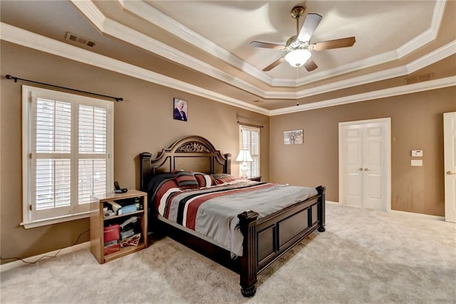 3565 Hickory Branch Trl, Suwanee, GA 30024 - bedroom featuring a raised ceiling, ornamental molding, carpet flooring, and ceiling fan