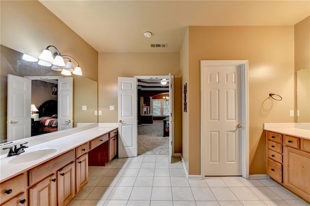 3565 Hickory Branch Trl, Suwanee, GA 30024 - ensuite bathroom featuring vanity, tile patterned floors, and baseboards