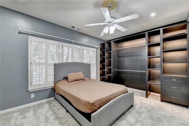 3565 Hickory Branch Trl, Suwanee, GA 30024 - carpeted bedroom with baseboards and a ceiling fan