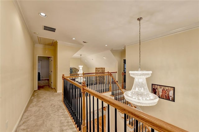 3565 Hickory Branch Trl, Suwanee, GA 30024 - hallway with attic access, an upstairs landing, ornamental molding, light colored carpet, and recessed lighting