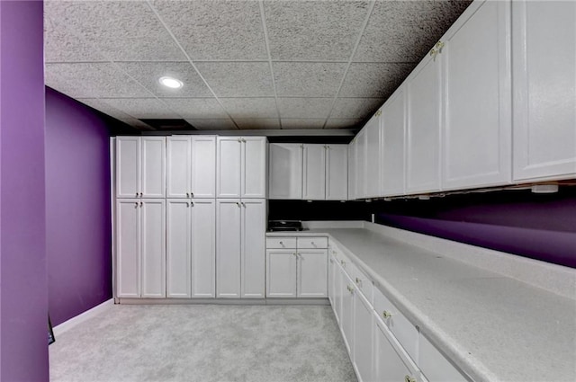 3565 Hickory Branch Trl, Suwanee, GA 30024 - kitchen featuring light colored carpet, white cabinetry, light countertops, and recessed lighting