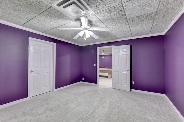 3565 Hickory Branch Trl, Suwanee, GA 30024 - unfurnished bedroom featuring carpet flooring, baseboards, ceiling fan, and a drop ceiling