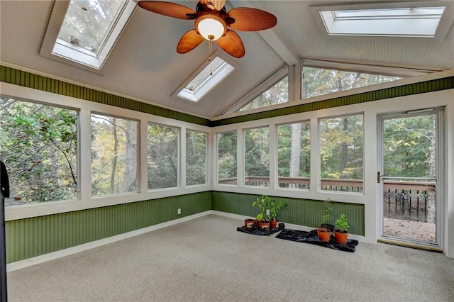 3565 Hickory Branch Trl, Suwanee, GA 30024 - unfurnished sunroom with a skylight, carpet flooring, vaulted ceiling, and healthy amount of natural light