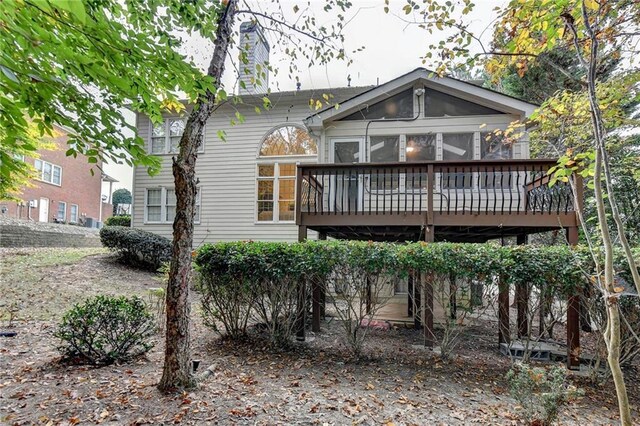 3565 Hickory Branch Trl, Suwanee, GA 30024 - back of house with a wooden deck