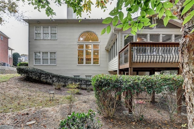 3565 Hickory Branch Trl, Suwanee, GA 30024 - back of property featuring a deck and a sunroom