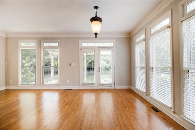 5575 Julian Pl, Atlanta, GA 30342 - doorway to outside featuring light wood-type flooring and ornamental molding