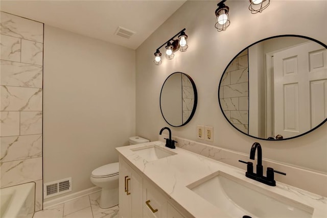 full bathroom with marble finish floor, visible vents, and a sink