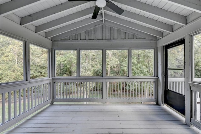 unfurnished sunroom with wooden ceiling and lofted ceiling with beams