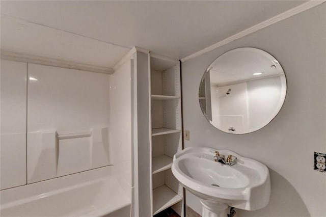 bathroom featuring a sink and washtub / shower combination