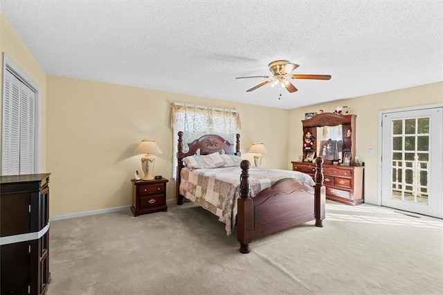 bedroom featuring light colored carpet, a ceiling fan, a textured ceiling, access to outside, and baseboards