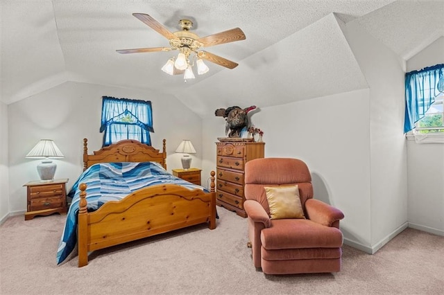 carpeted bedroom featuring multiple windows, vaulted ceiling, and a textured ceiling