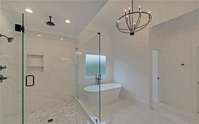 bathroom featuring plus walk in shower and a notable chandelier