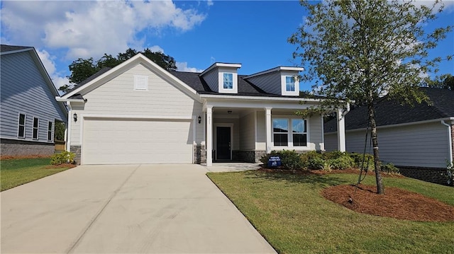 621 Pineberry Ct, Grayson, GA 30017 - craftsman house with an attached garage, driveway, a front yard, and stone siding