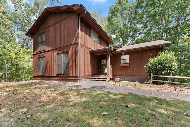 exterior space with a front lawn