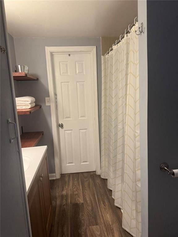 full bath featuring wood finished floors and vanity