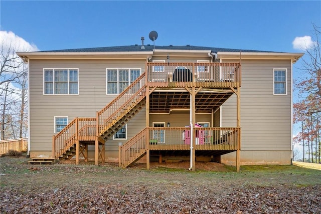 back of house featuring a deck