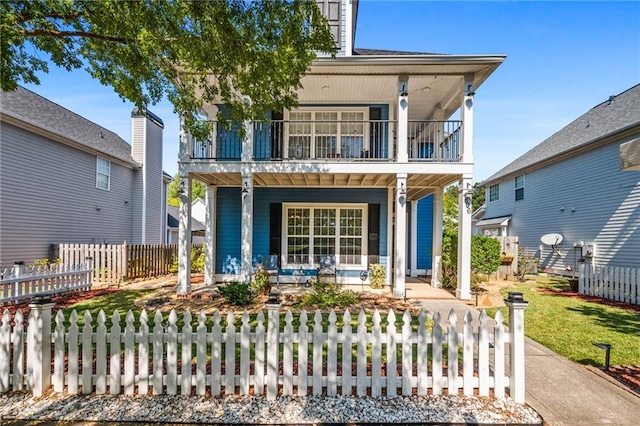 view of front of house featuring a porch and a balcony