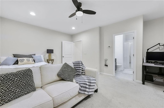 carpeted bedroom with recessed lighting, baseboards, ensuite bathroom, and ceiling fan