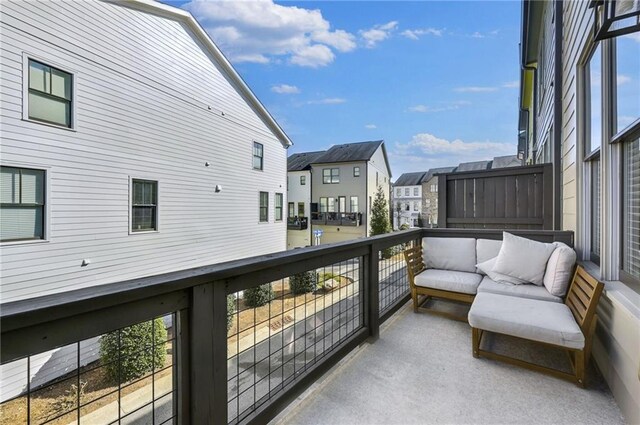 balcony featuring a residential view