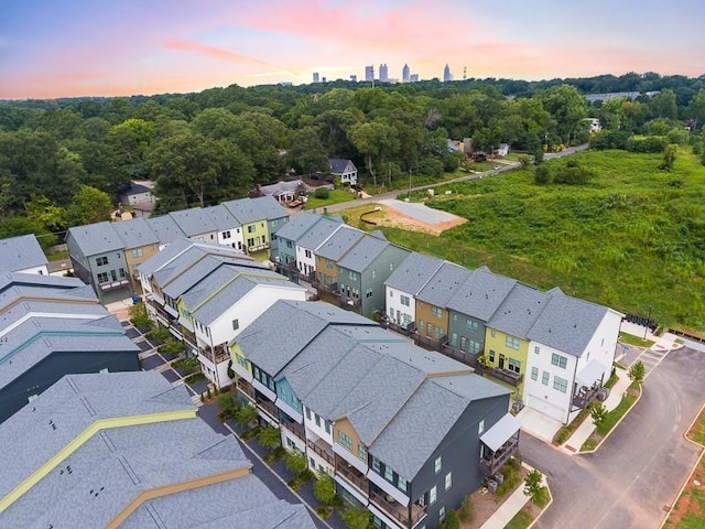 aerial view at dusk with a residential view