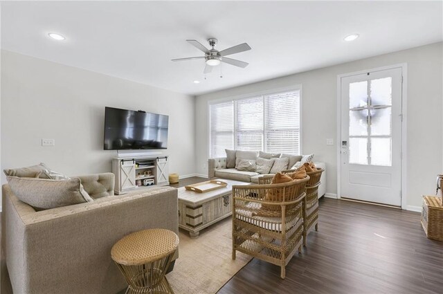 living area featuring ceiling fan, baseboards, wood finished floors, and recessed lighting