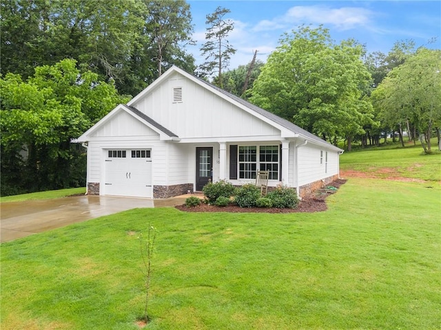 1672 Meadow Lark Ln, Gainesville, GA 30501 - view of front facade with board and batten siding, a front lawn, driveway, and an attached garage
