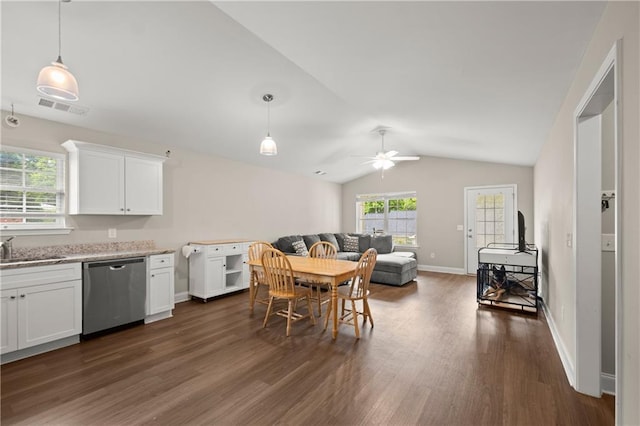 1672 Meadow Lark Ln, Gainesville, GA 30501 - kitchen featuring stainless steel dishwasher, dark wood-style flooring, vaulted ceiling, ceiling fan, and white cabinets