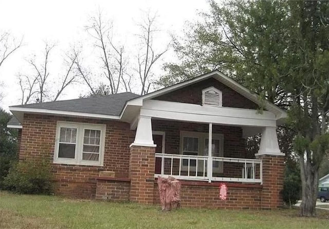 bungalow-style home with a porch