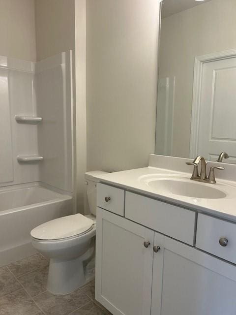 full bathroom with toilet, vanity, tile patterned flooring, and bathing tub / shower combination