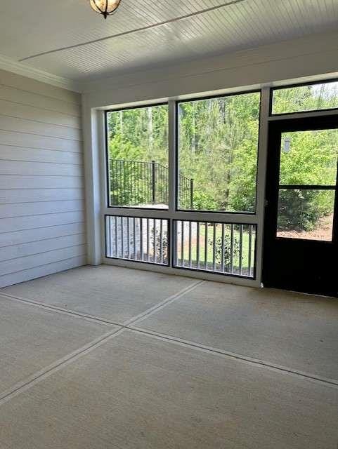 view of unfurnished sunroom