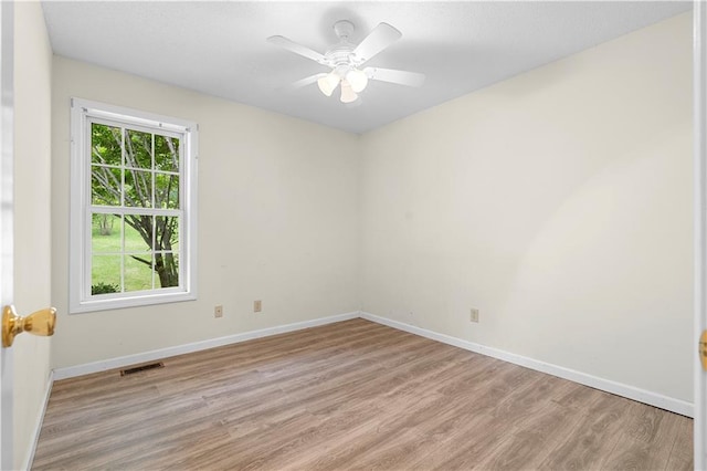 6752 Stringer Rd, Clermont, GA 30527 - unfurnished room featuring light wood-type flooring, baseboards, and a ceiling fan