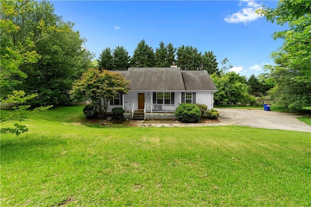 6752 Stringer Rd, Clermont, GA 30527 - view of front facade with covered porch, a front lawn, and a chimney