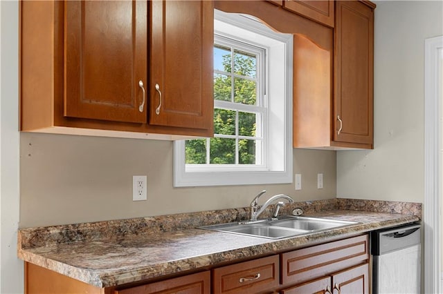 6752 Stringer Rd, Clermont, GA 30527 - kitchen with dishwasher, healthy amount of natural light, a sink, and brown cabinets